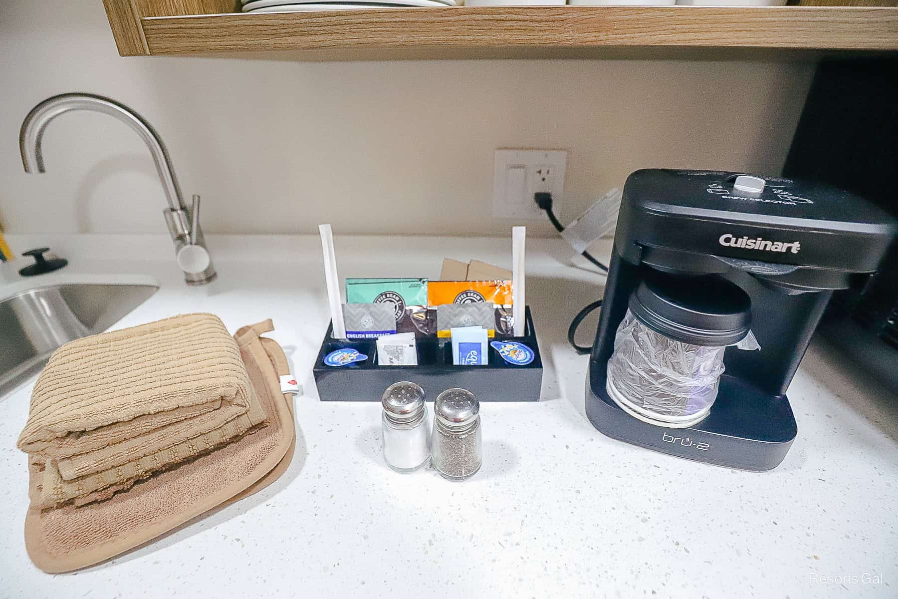 an individual cup coffee maker and other kitchen items 