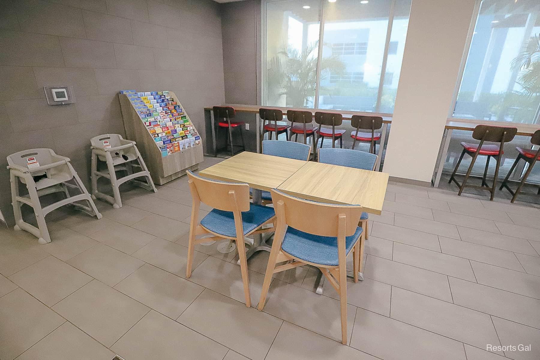 the dining area in the lobby of the Hilton Home2 at Winter Garden