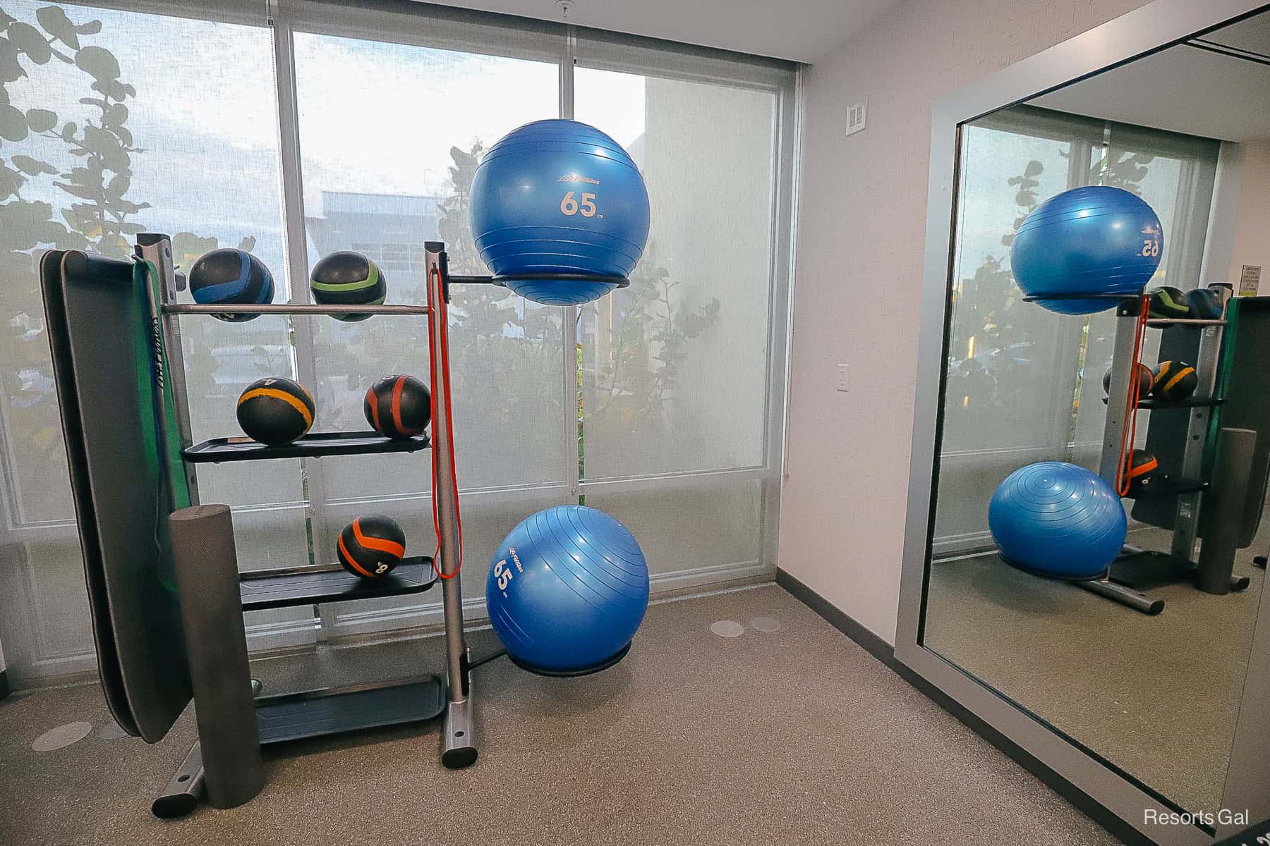 a corner with weighted exercise balls 
