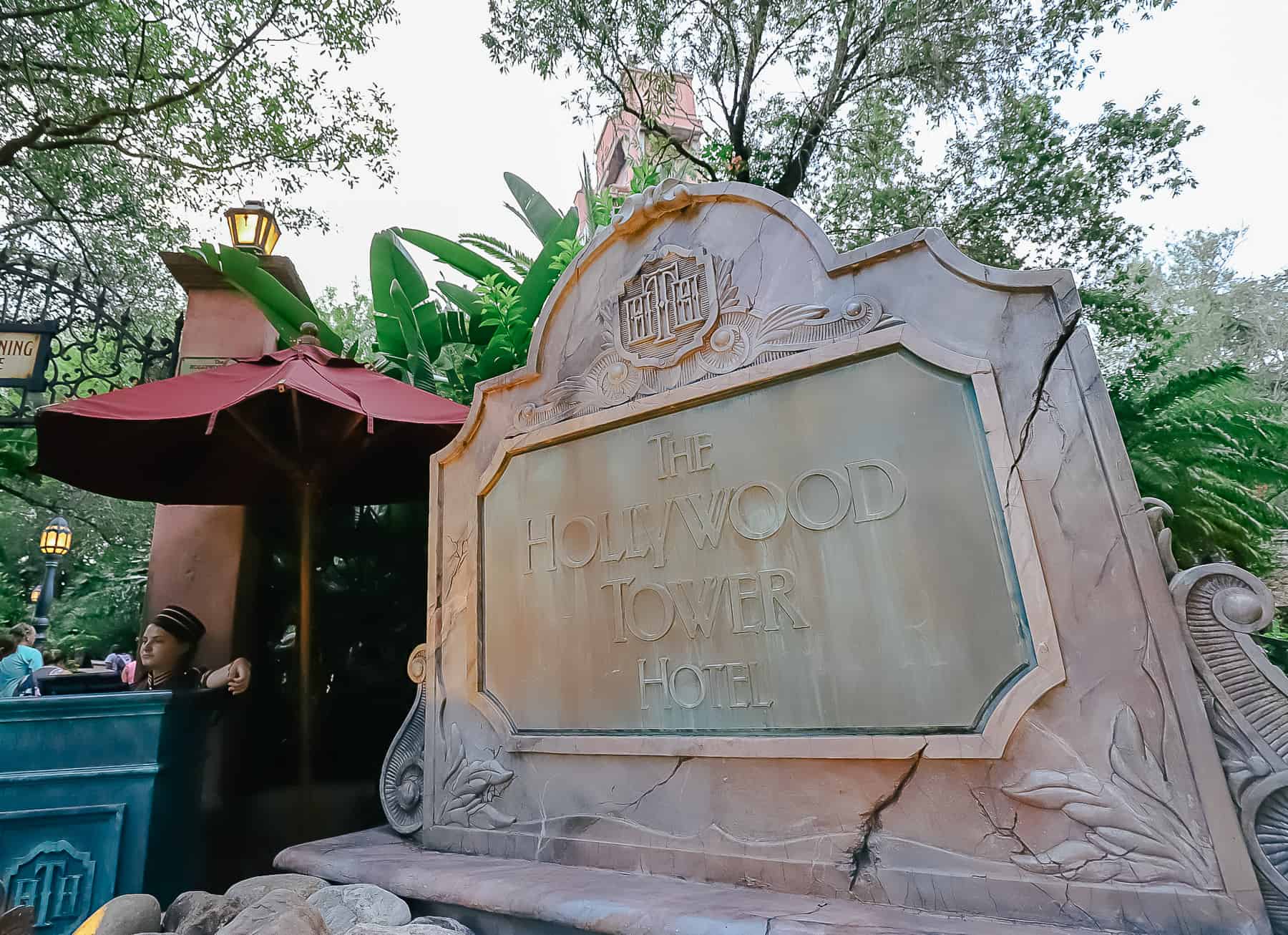 entrance sign that reads The Hollywood Tower Hotel 