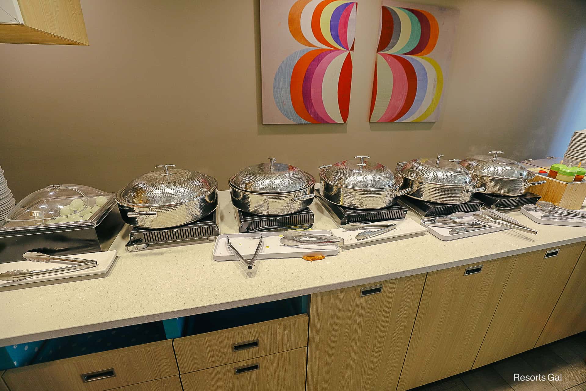 hot items in covered containers for breakfast at the Home2 Hilton's complimentary buffet