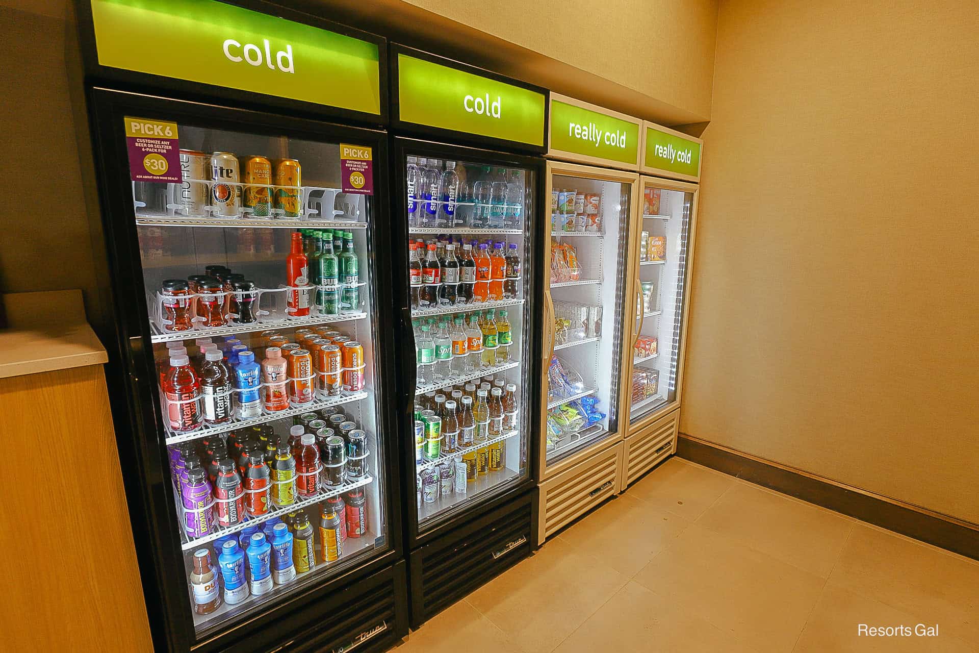 a market area with refrigerated items for purchase