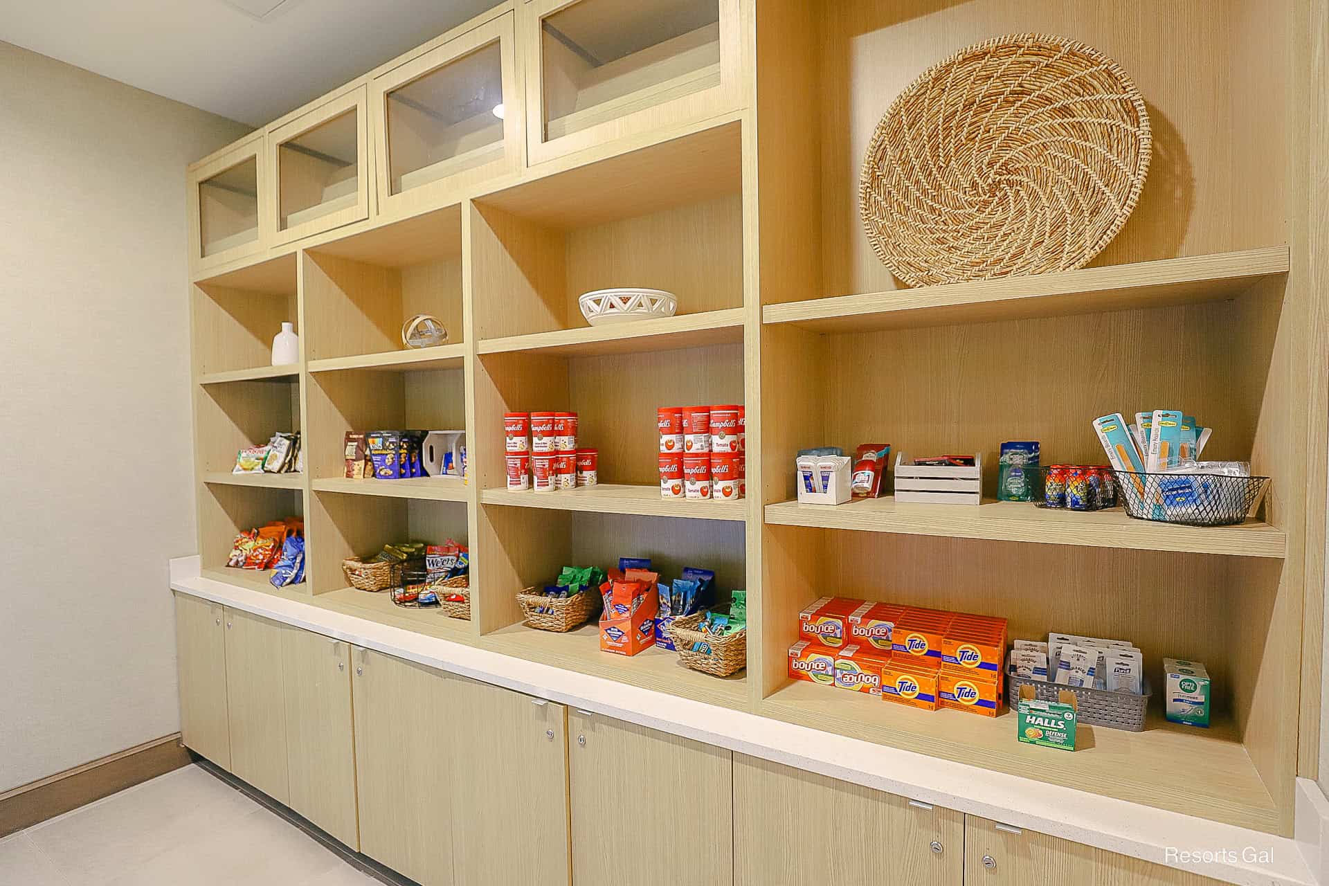 a pantry area in the market with items for puchase
