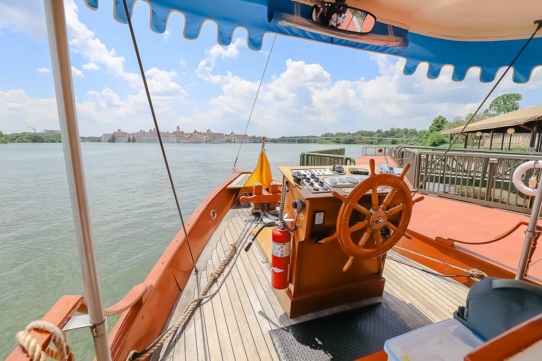 a boat headed toward Grand Floridian Resort from Magic Kingdom 