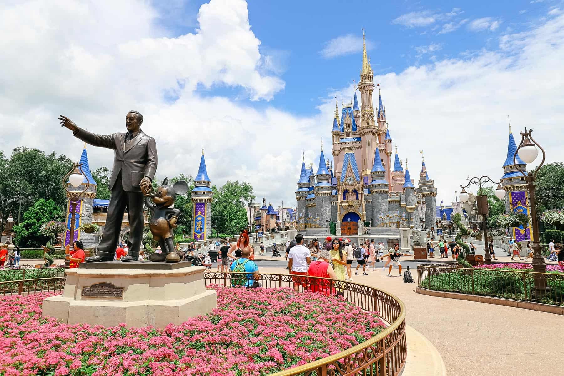 Magic Kingdom in the summer with Cinderella in the background. 