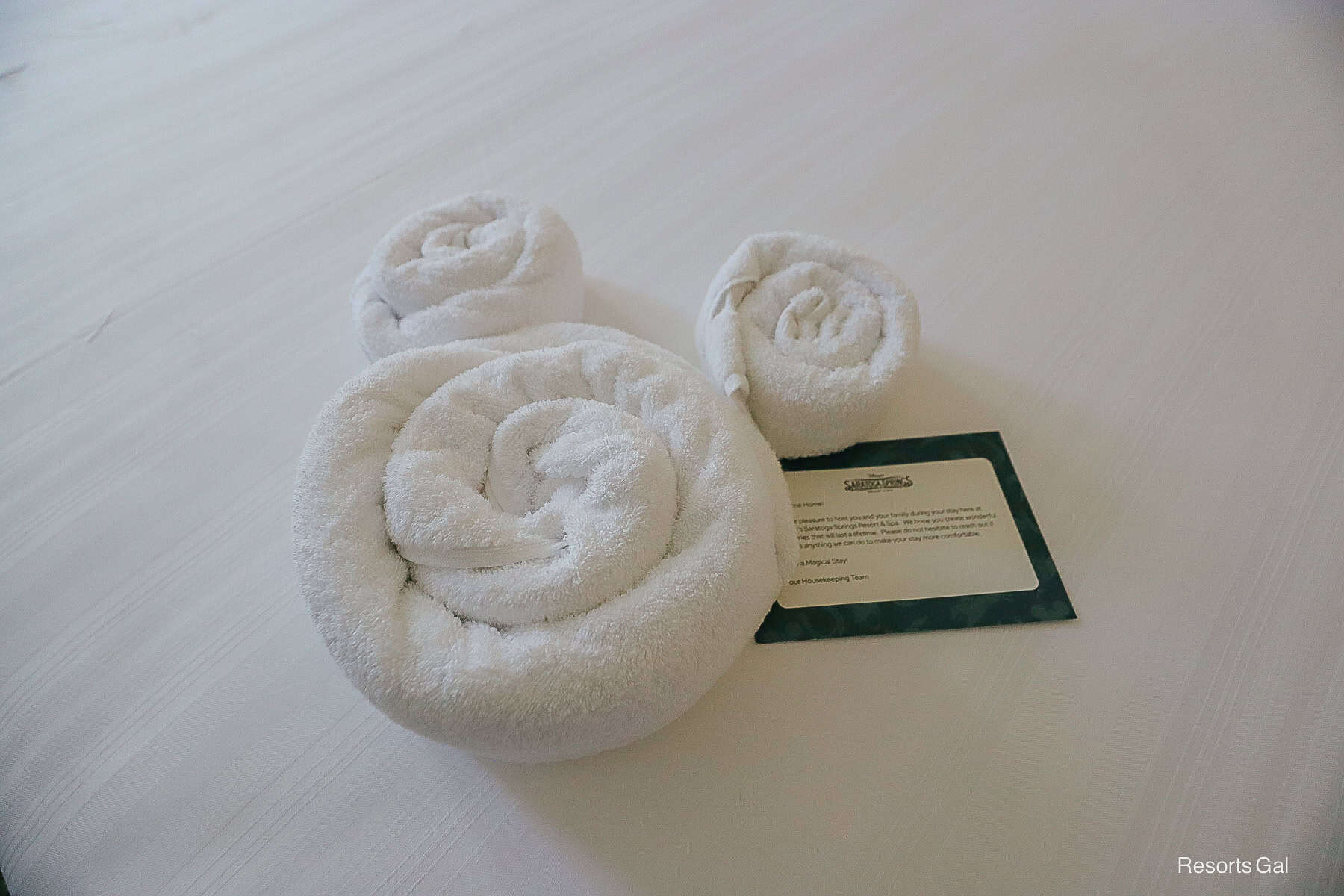 a Mickey Mouse towel left by Mousekeeping in a Disney Resort Room

