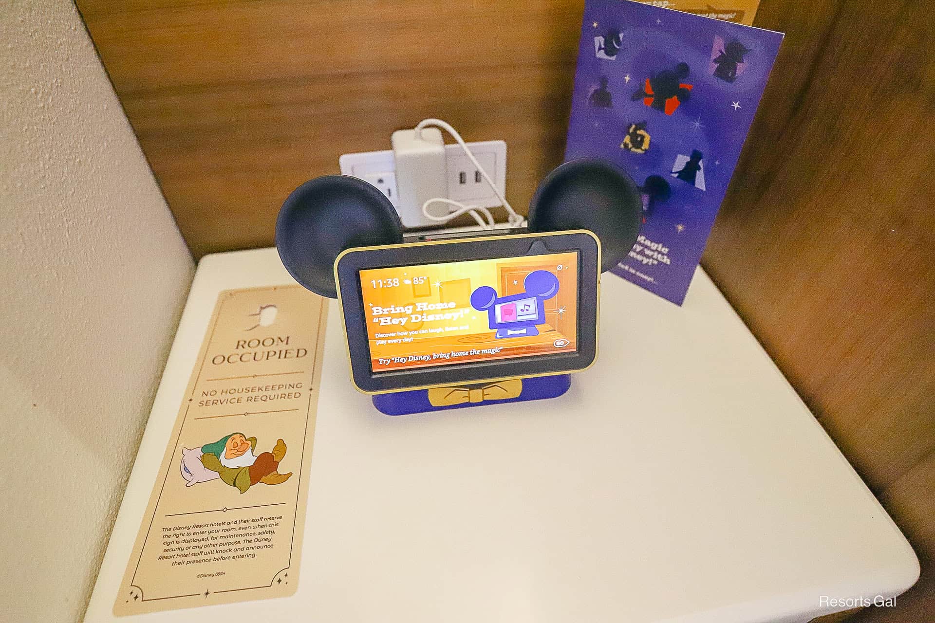 a Hey Disney Device and a Room Occupied Sign for No Housekeeping Required 