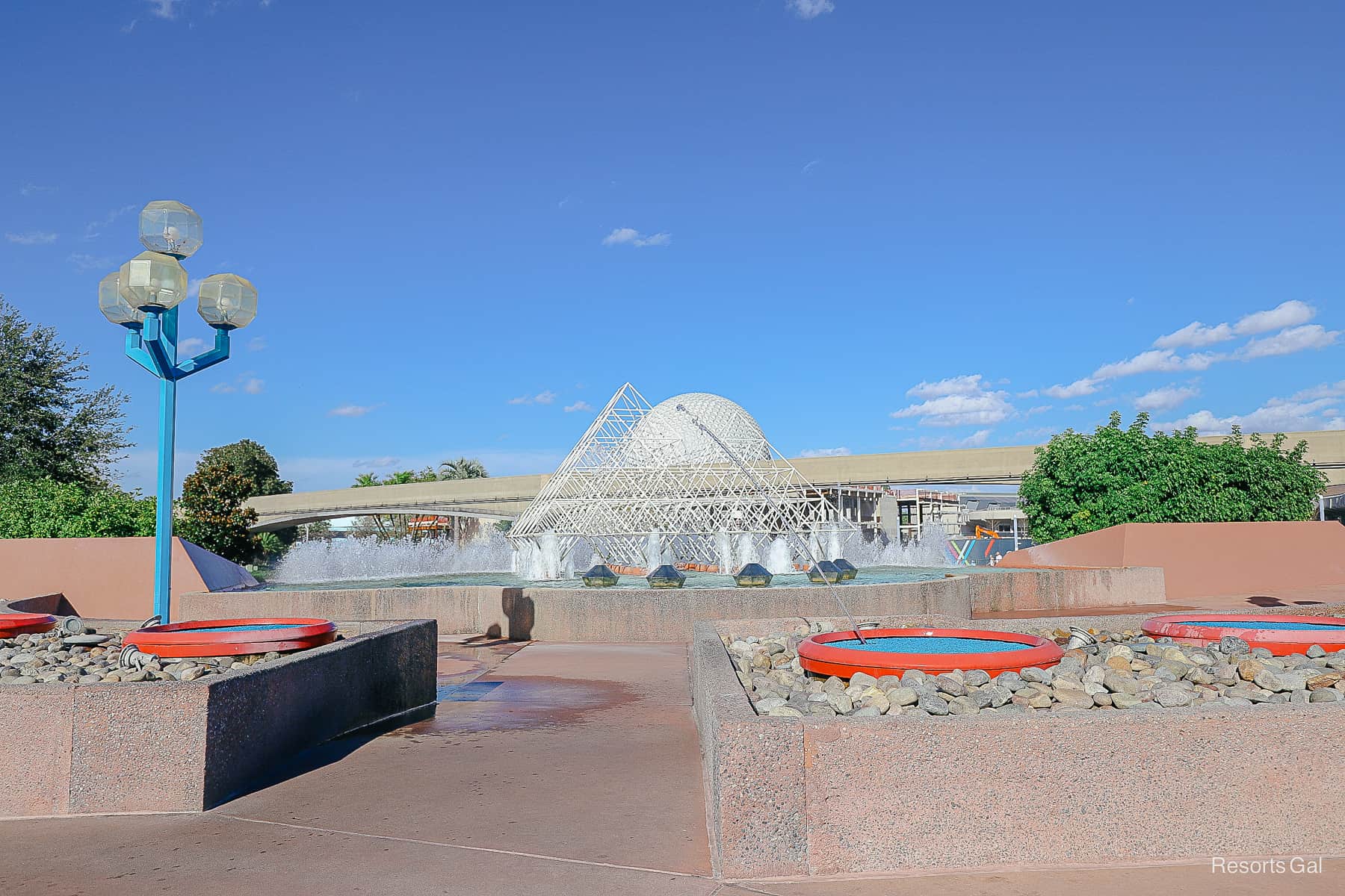 The gap between two of the leaping fountains where a guest could get wet if the water hit them.