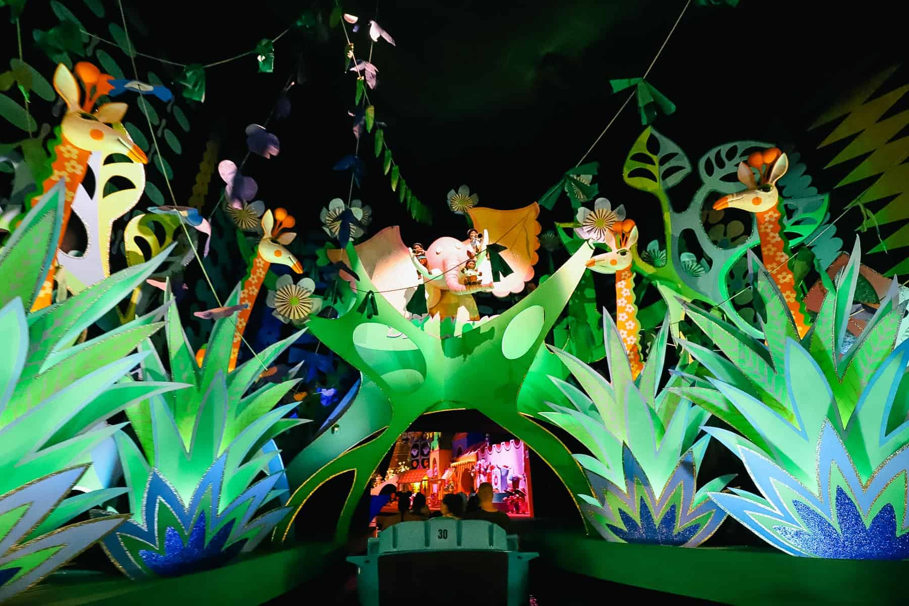 "it's a small world" elephants and giraffe scene 