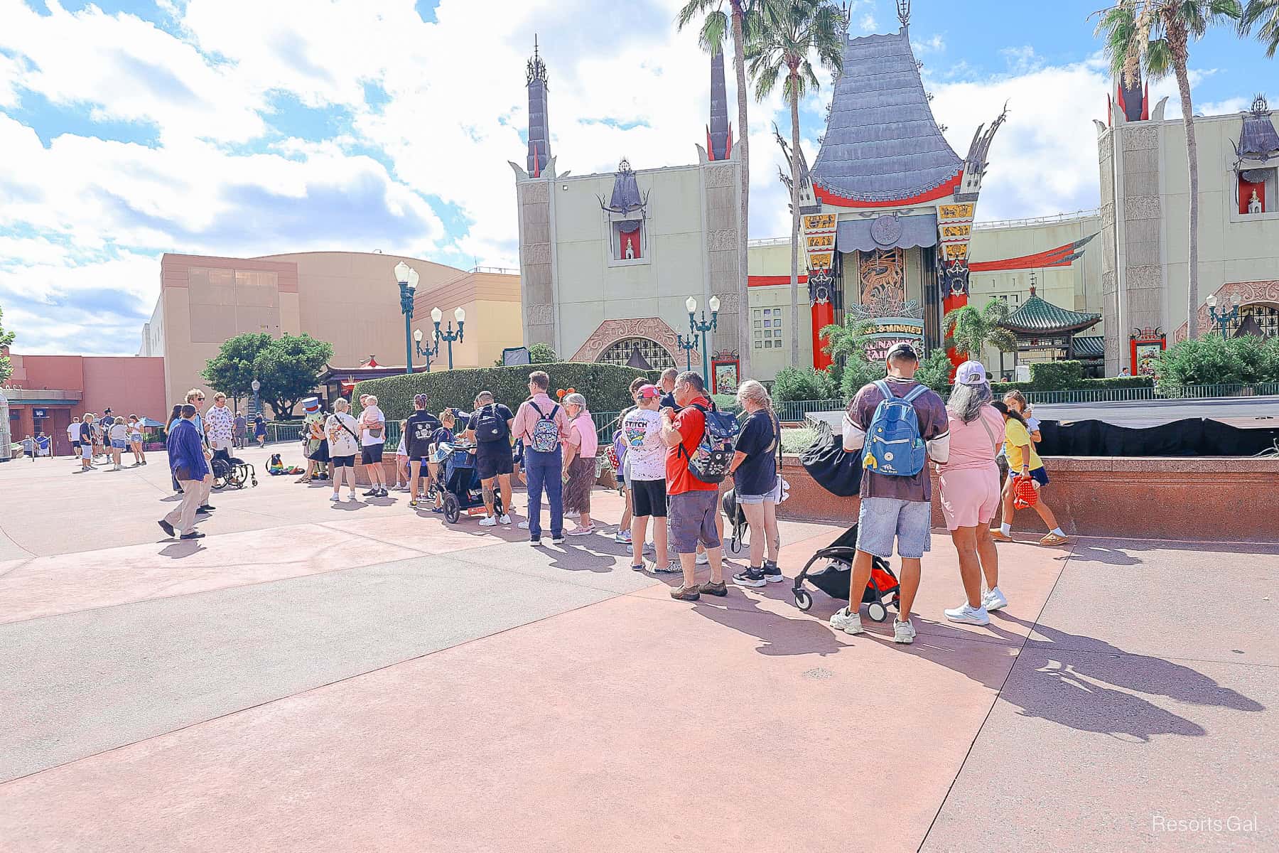guests standing in line to meet Jiminy Cricket