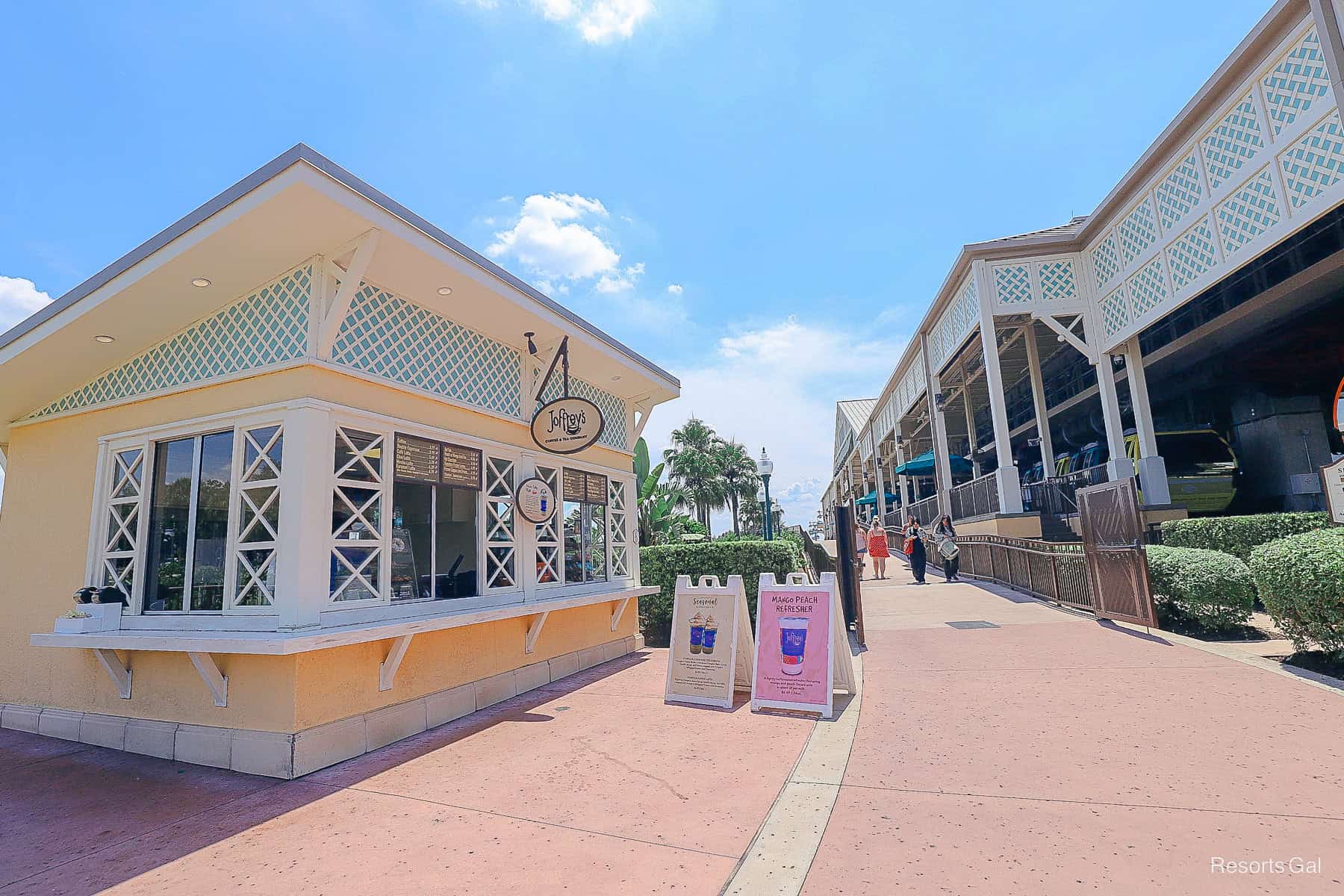 the coffee stand sits in front of the main Skyliner station at Disney's Caribbean Beach