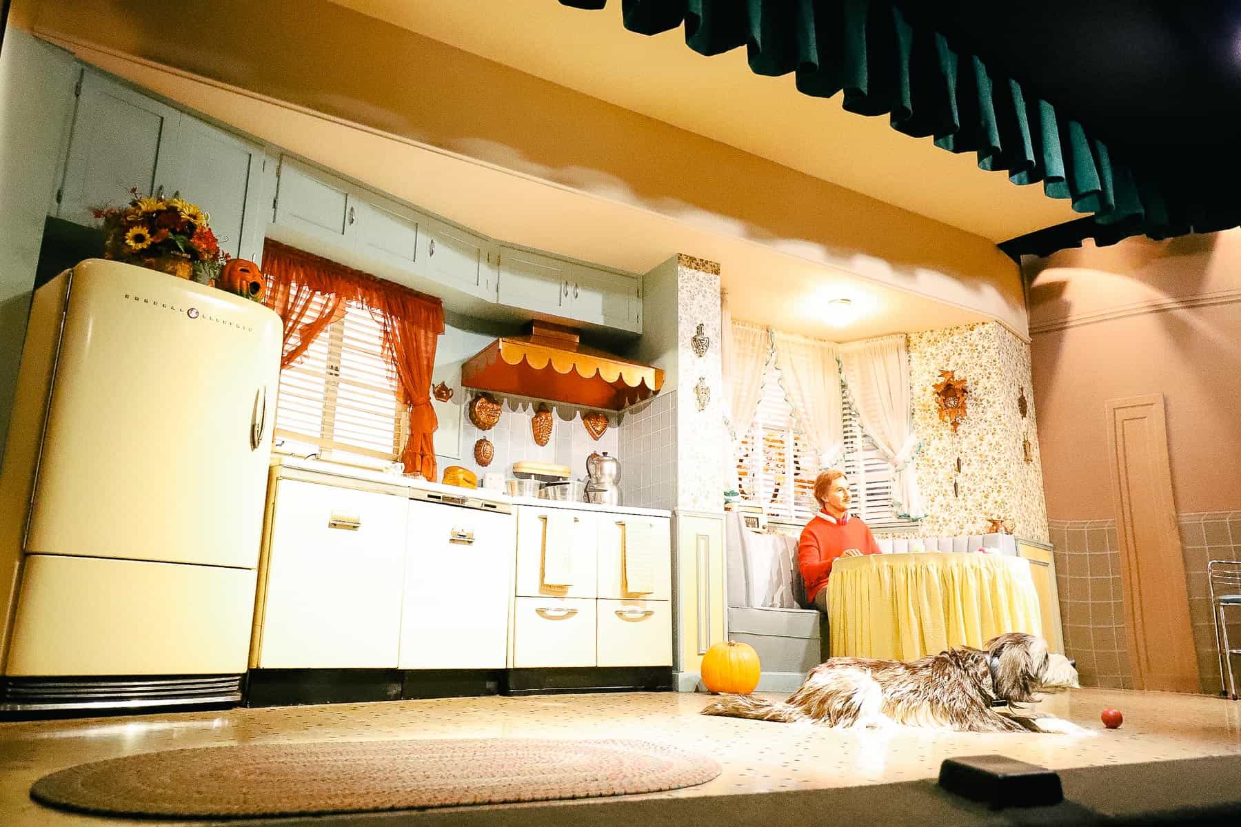 John and Rover in the updated kitchen in the 1940s. 