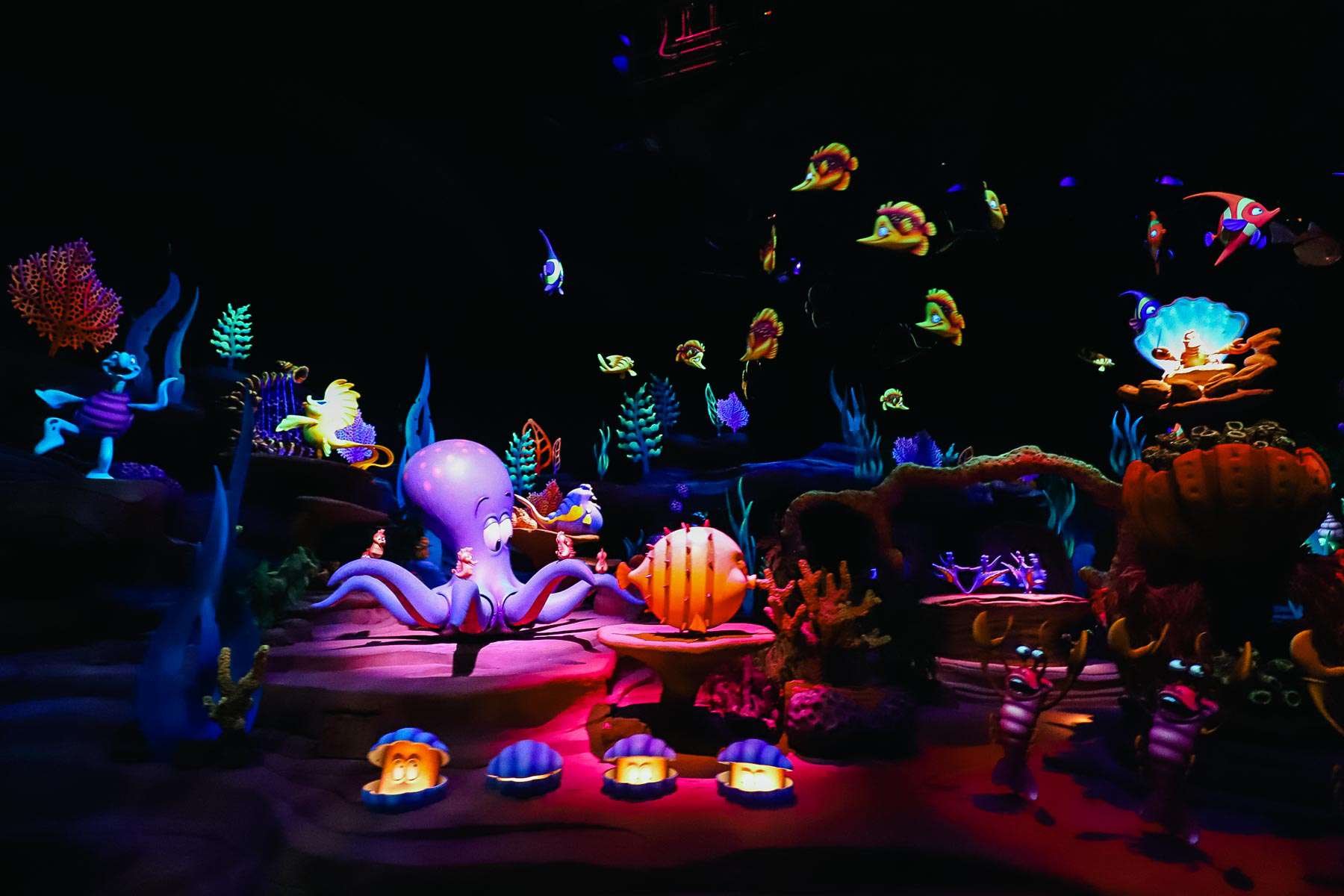 Under the Sea scene with lots of fish singing, dancing, and playing instruments. 