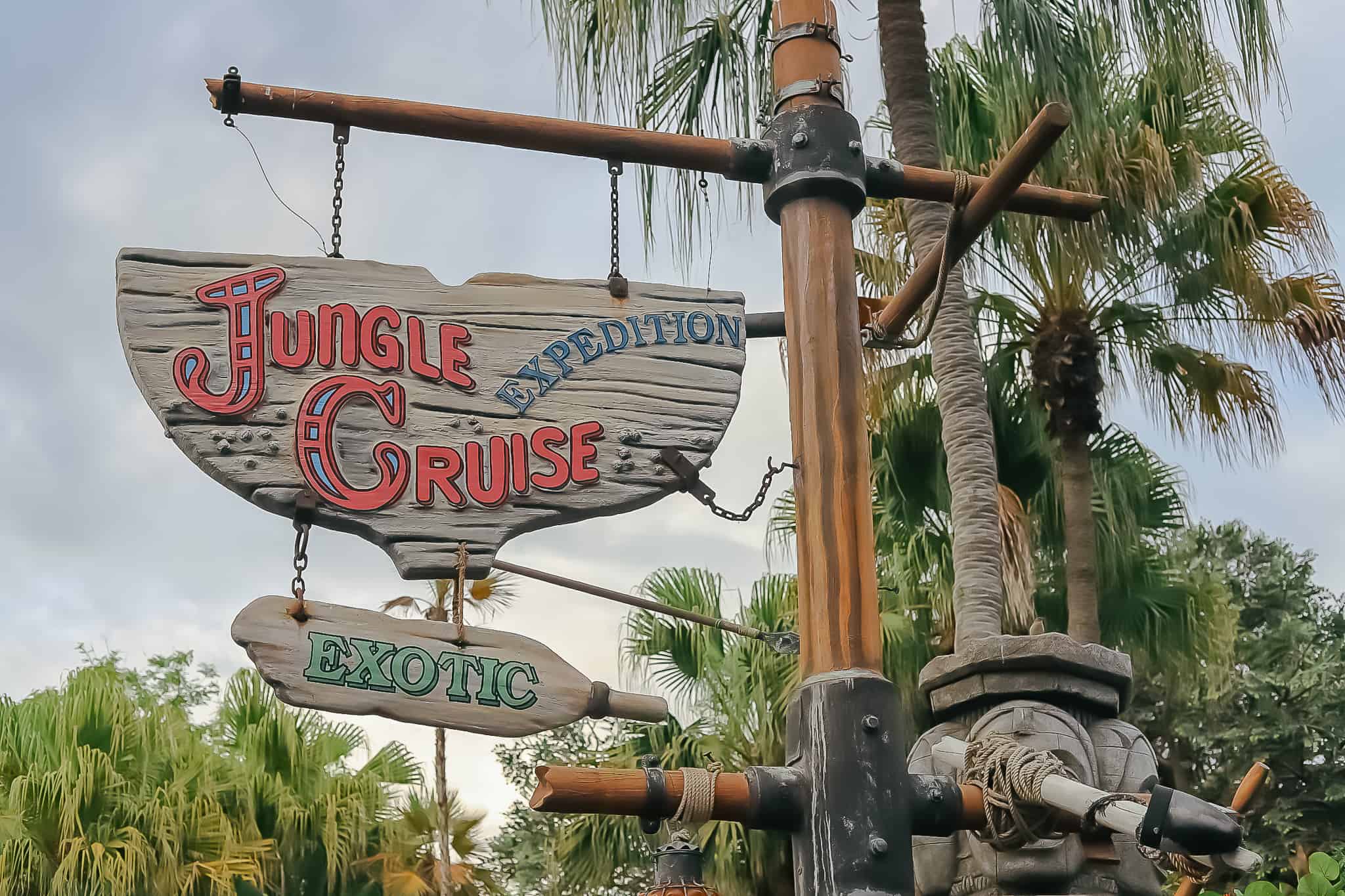 sign that sits near the entrance of Jungle Cruise that says "Jungle Cruise Exotic Expedition"
