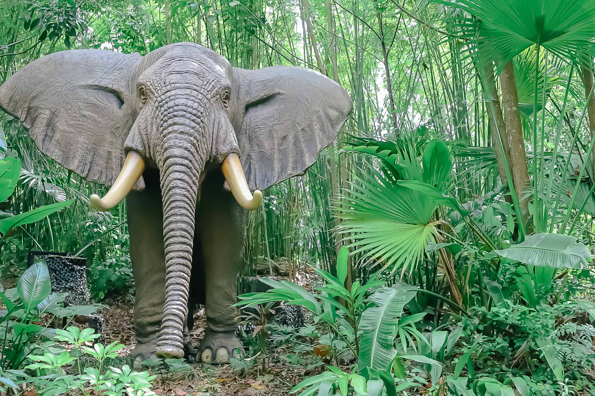 a large Matriarch elephant animatronic in the bushes of the Jungle Cruise