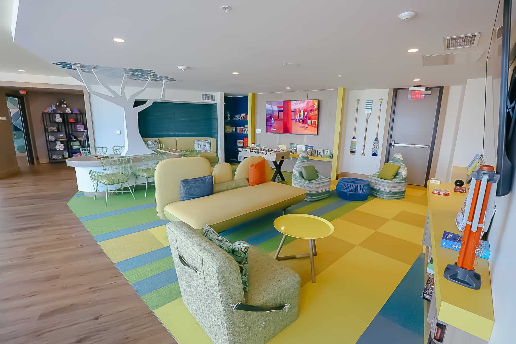 kid's lounge with pint-size seats and sofas 