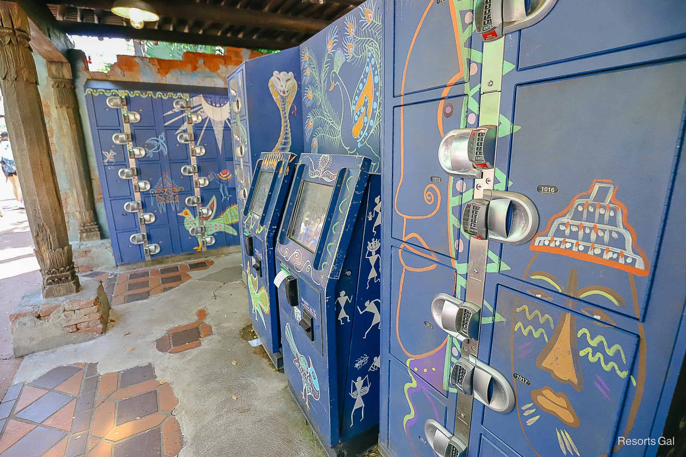 lockers with blue paint and Asian designs painted on them 