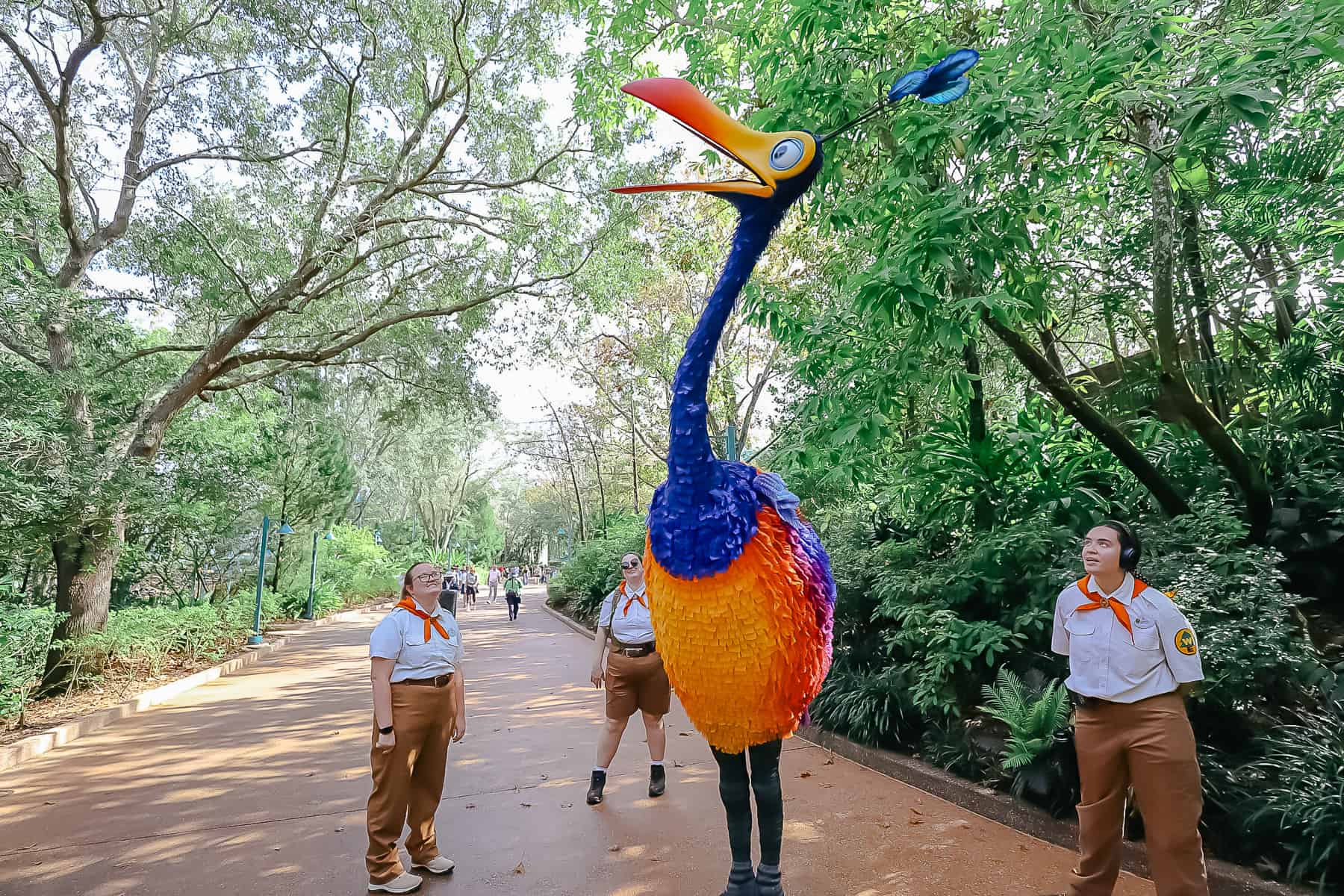 Kevin poses for a few photos on an almost empty path around Dinoland at Disney's Animal Kingdom. 