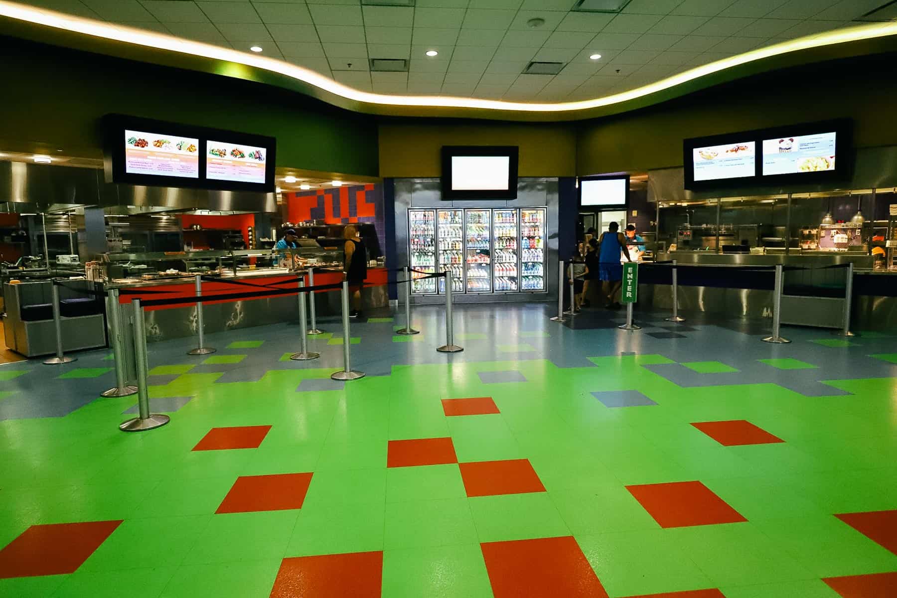 interior food court area with stations offering various cuisines 