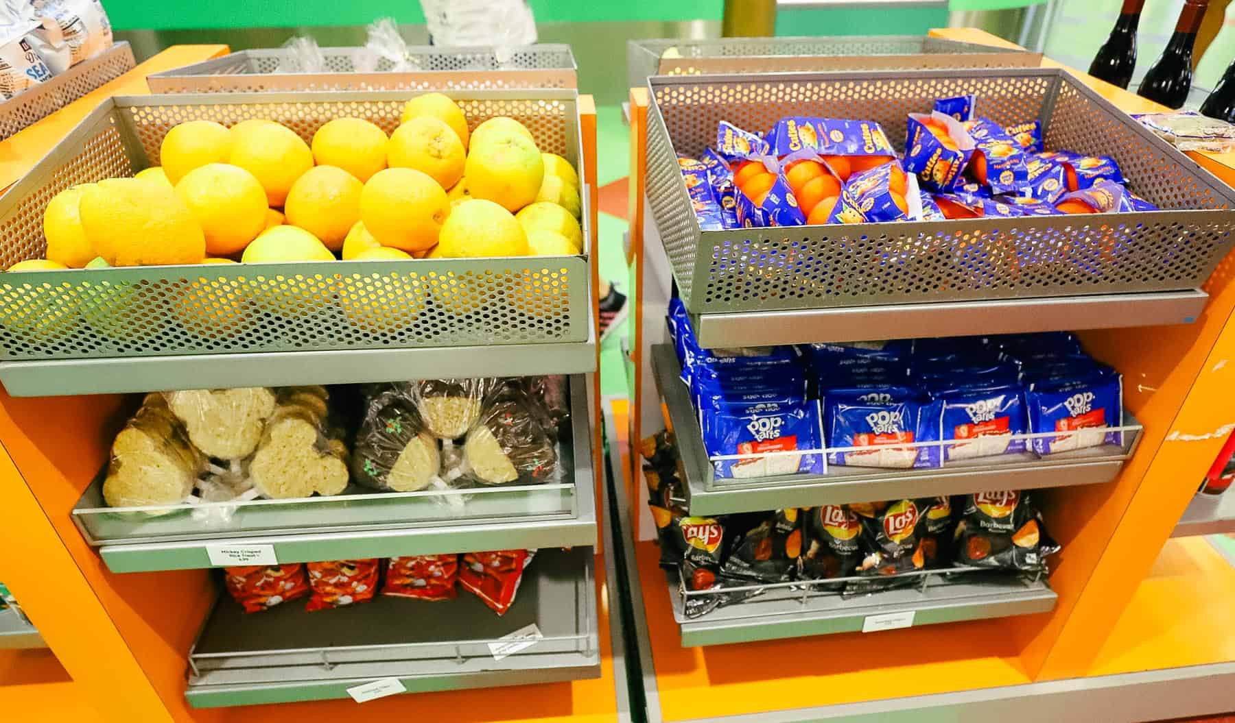 a display with oranges, Cuties, Pop Tarts, and Chips at Landscape of Flavors 