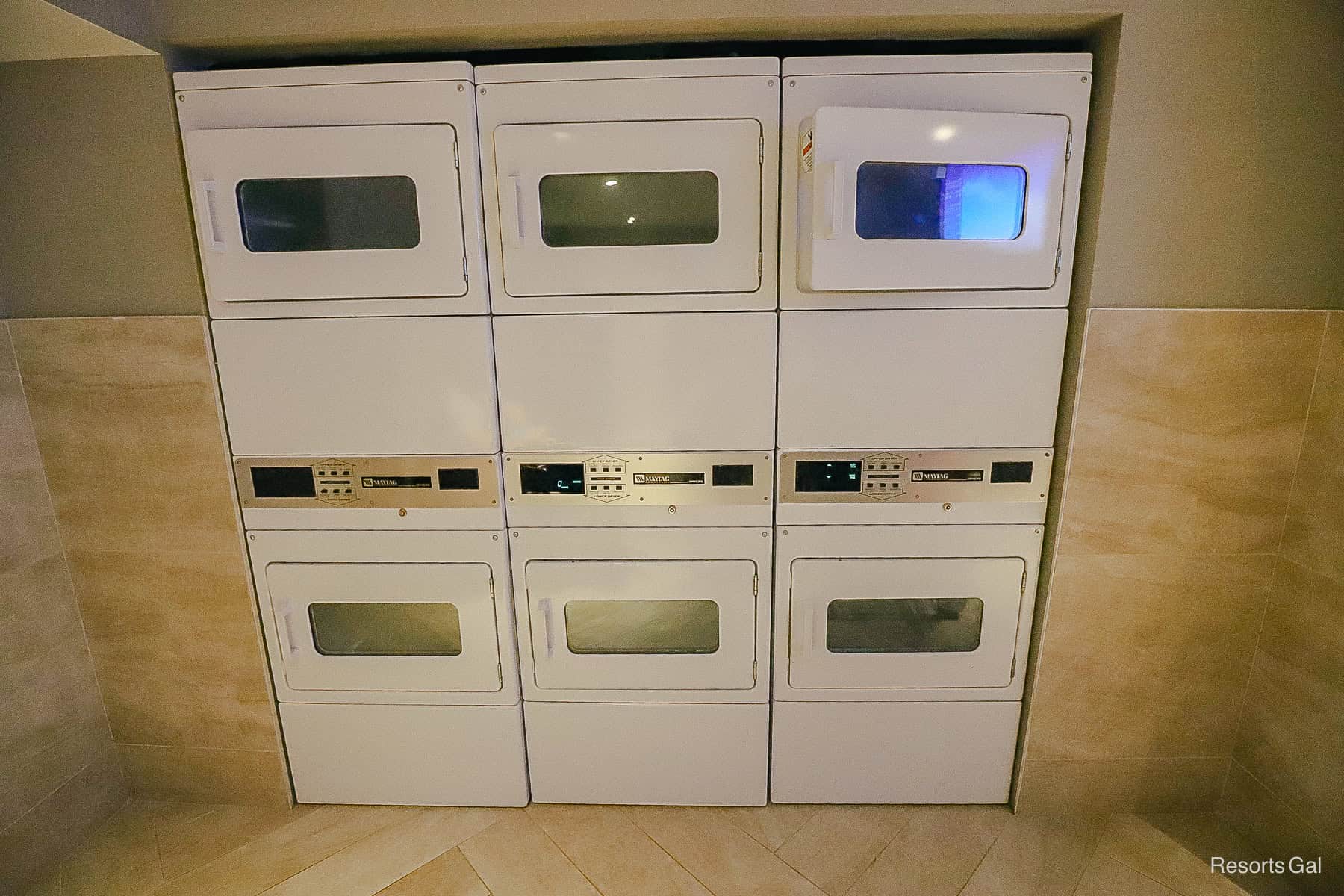 six dryers on the wall at the laundry room at Disney's Riviera 