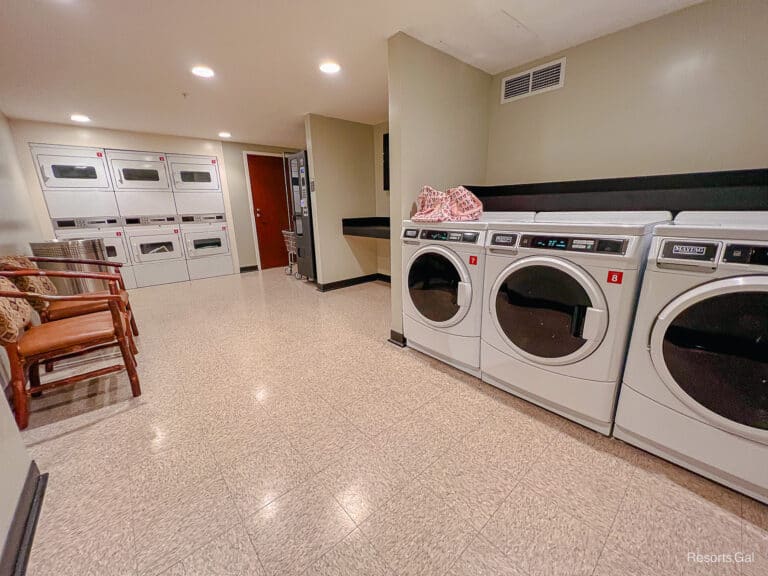 a laundry room with washers and dryers at Walt Disney World Resorts