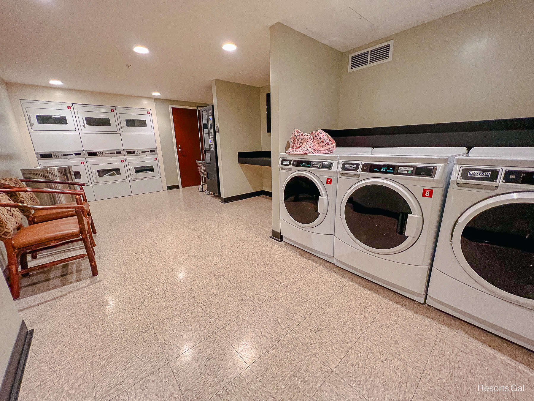 a laundry room with washers and dryers at Walt Disney World Resorts