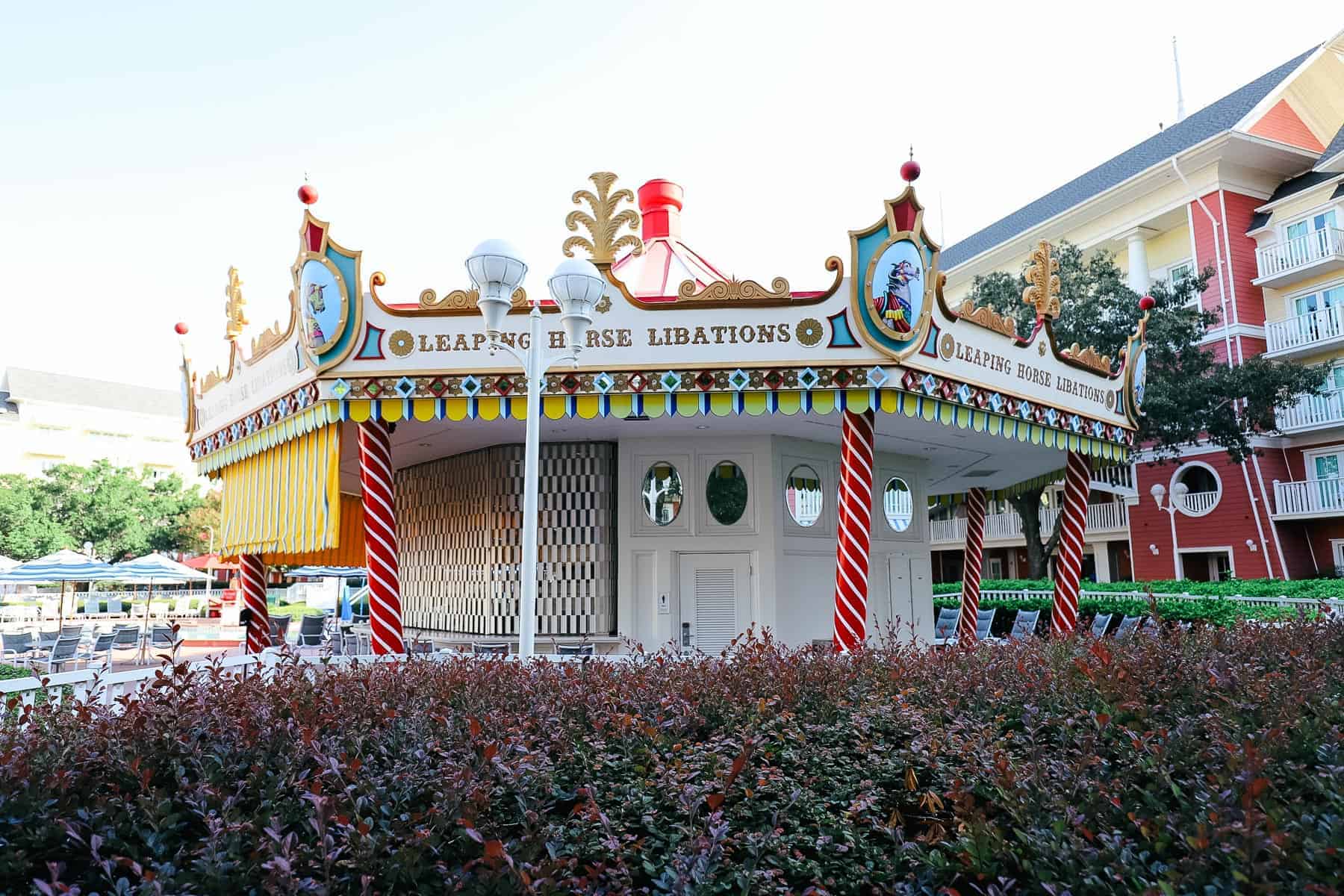 a poolside bar that looks like a carousel 