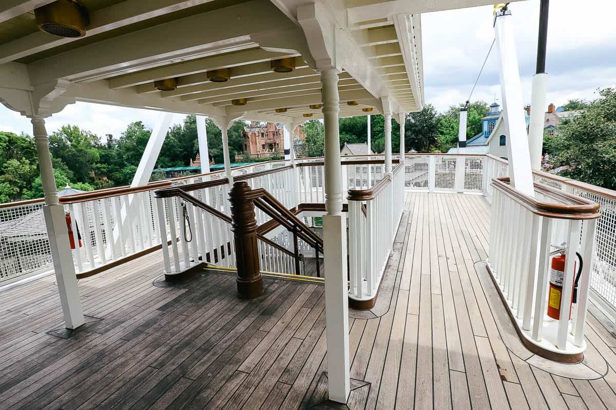 Railings on the boat for guests to stand against. 