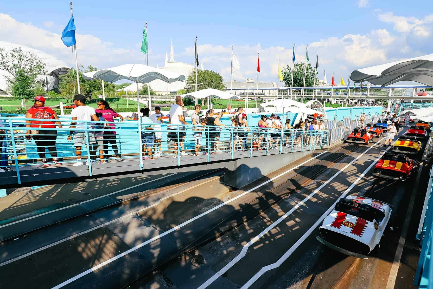 A line of cars waiting to take off. 