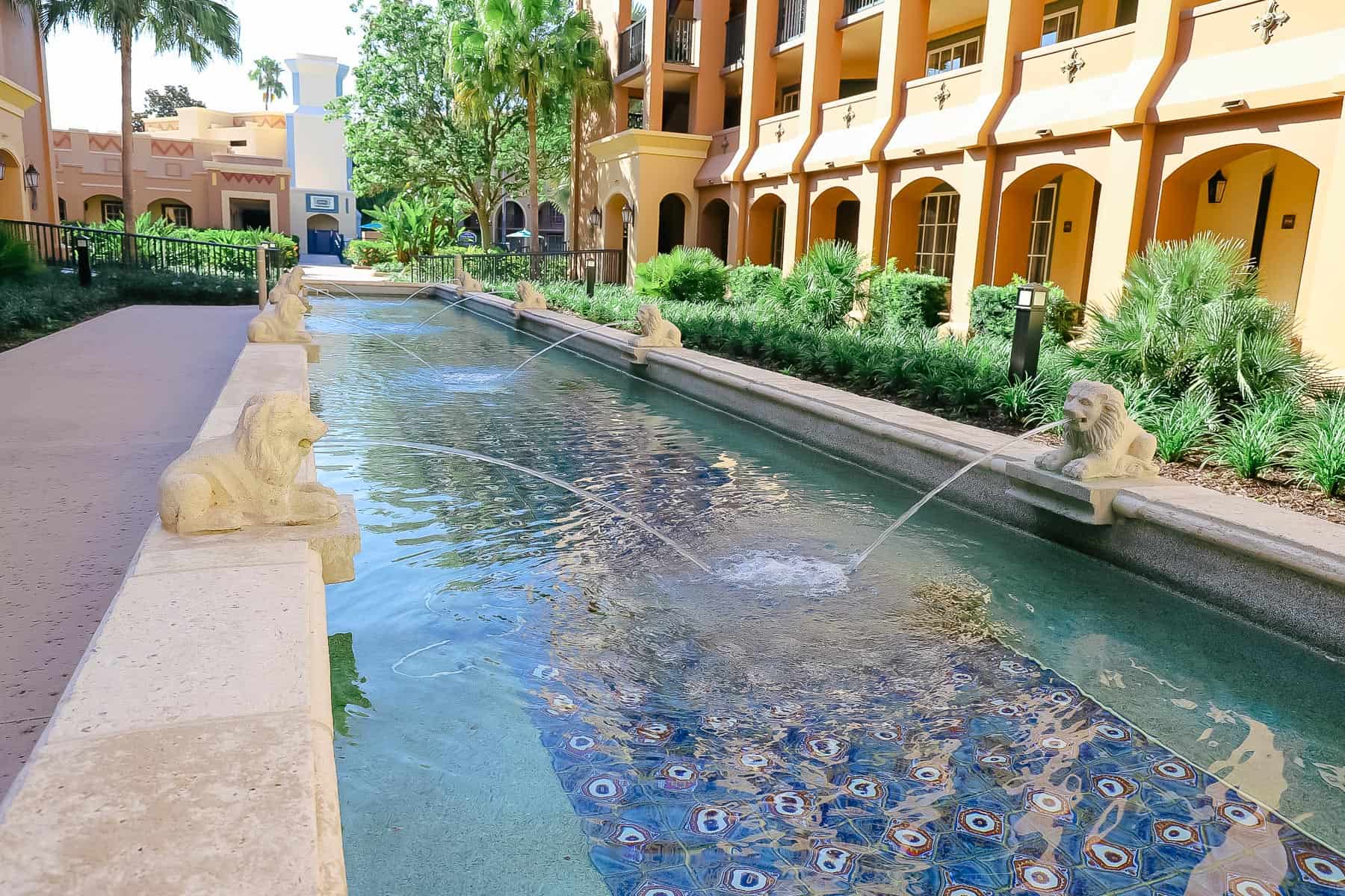 A long fountain extends the length between two buildings in the Casitas at Coronado Springs. 