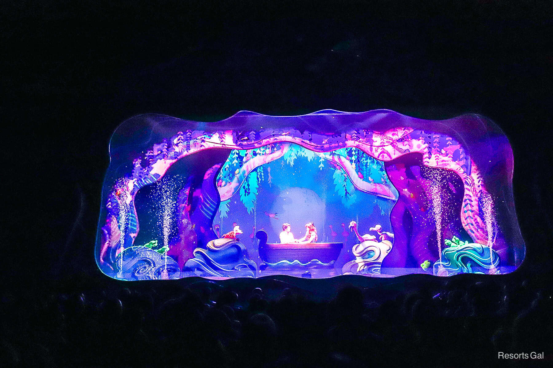 Ariel and Prince Eric in a boat as 'Kiss the Girl' plays