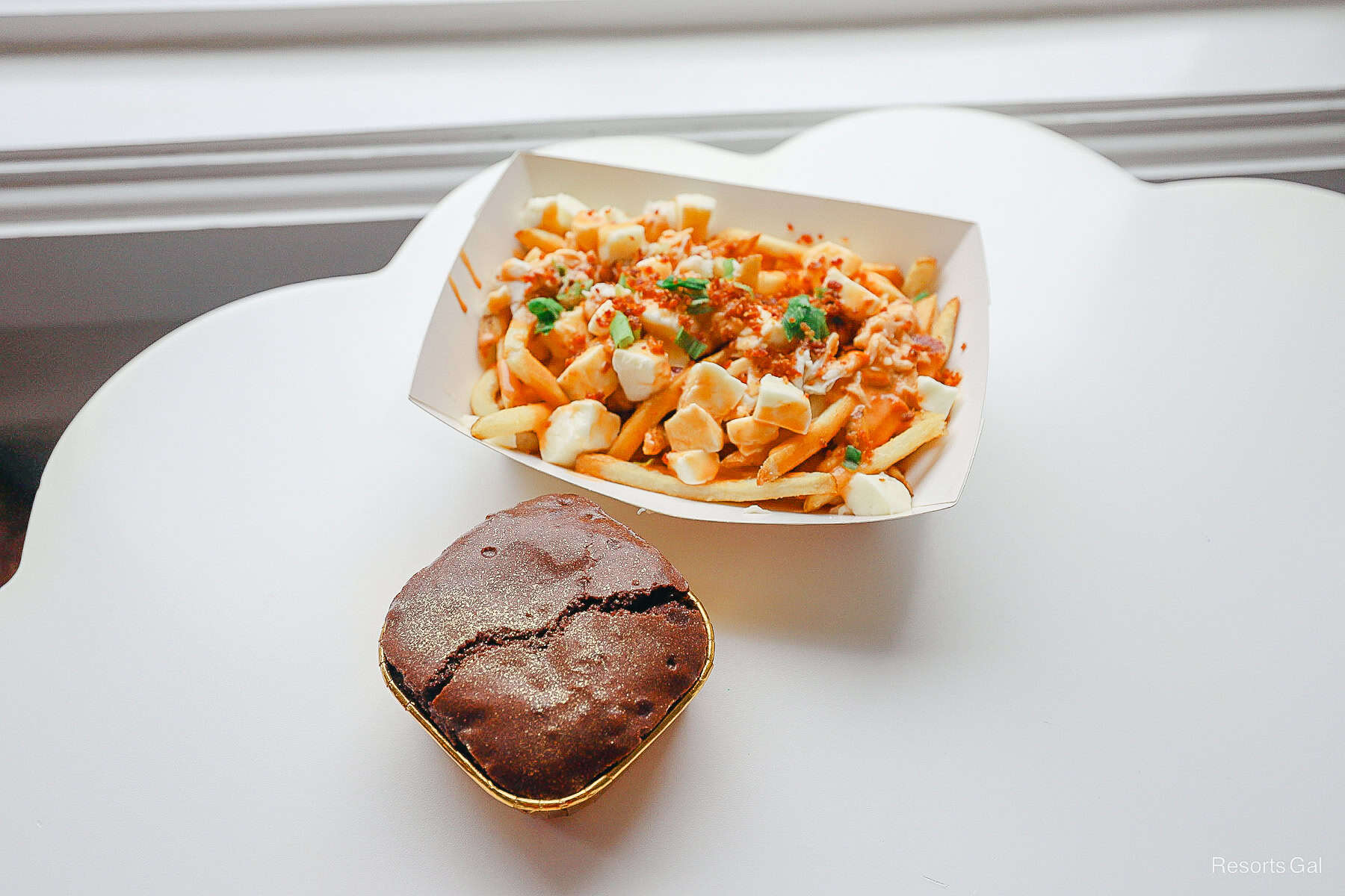 an order of crab fries from Hurricane Hanna's paired with a brownie from the Cake Bake Shop