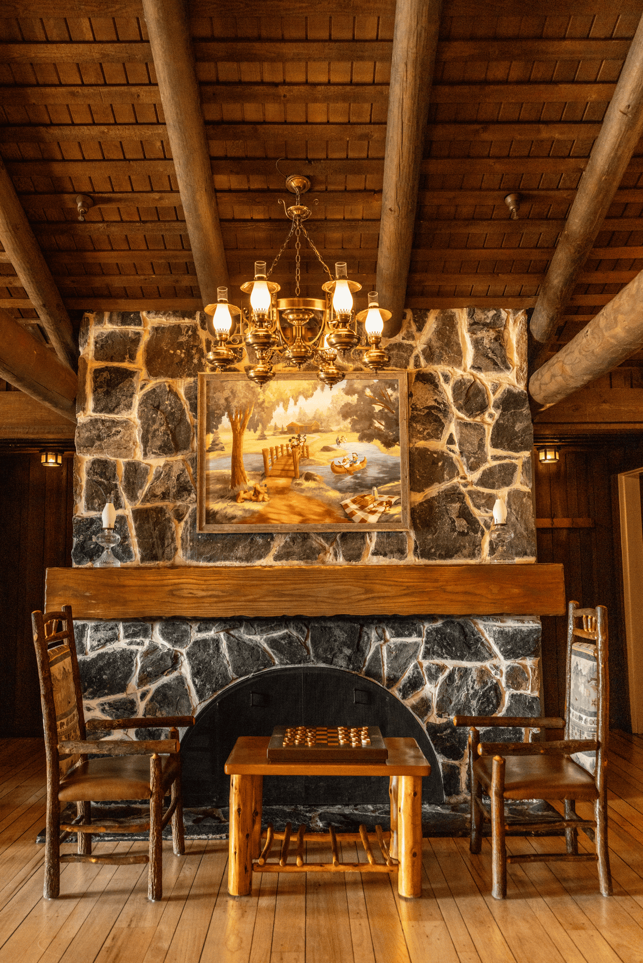 lobby fireplace with tables and chairs update at Fort Wilderness