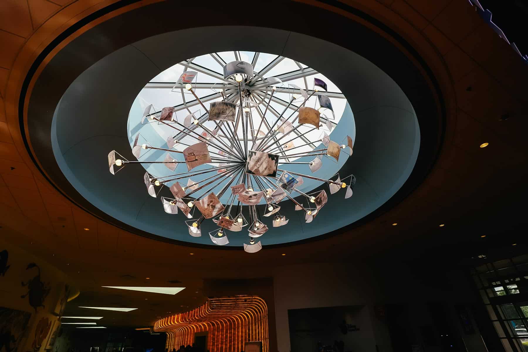 the lobby light fixture features sketch art 