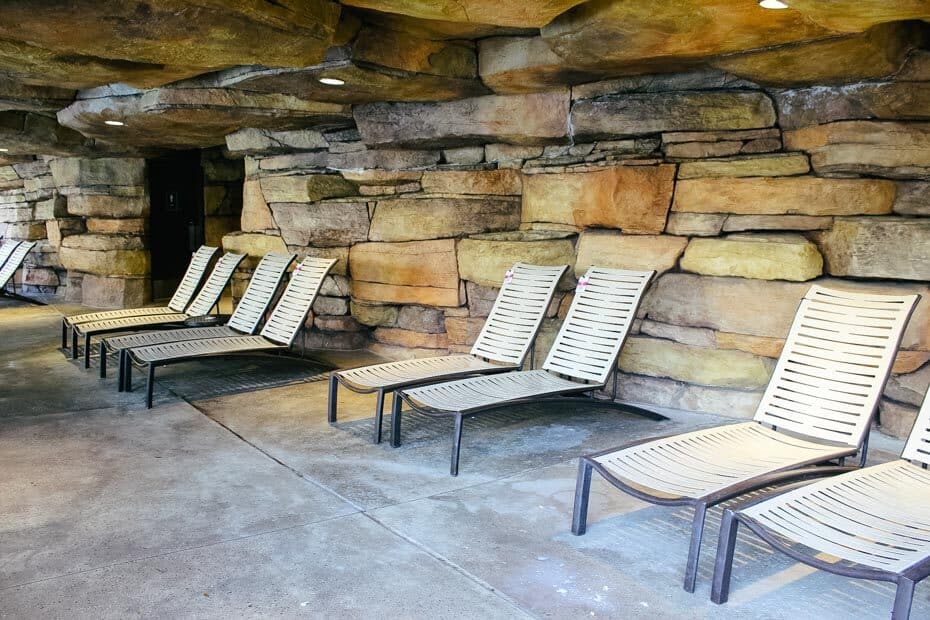 lounge chairs sitting under the grotto area 