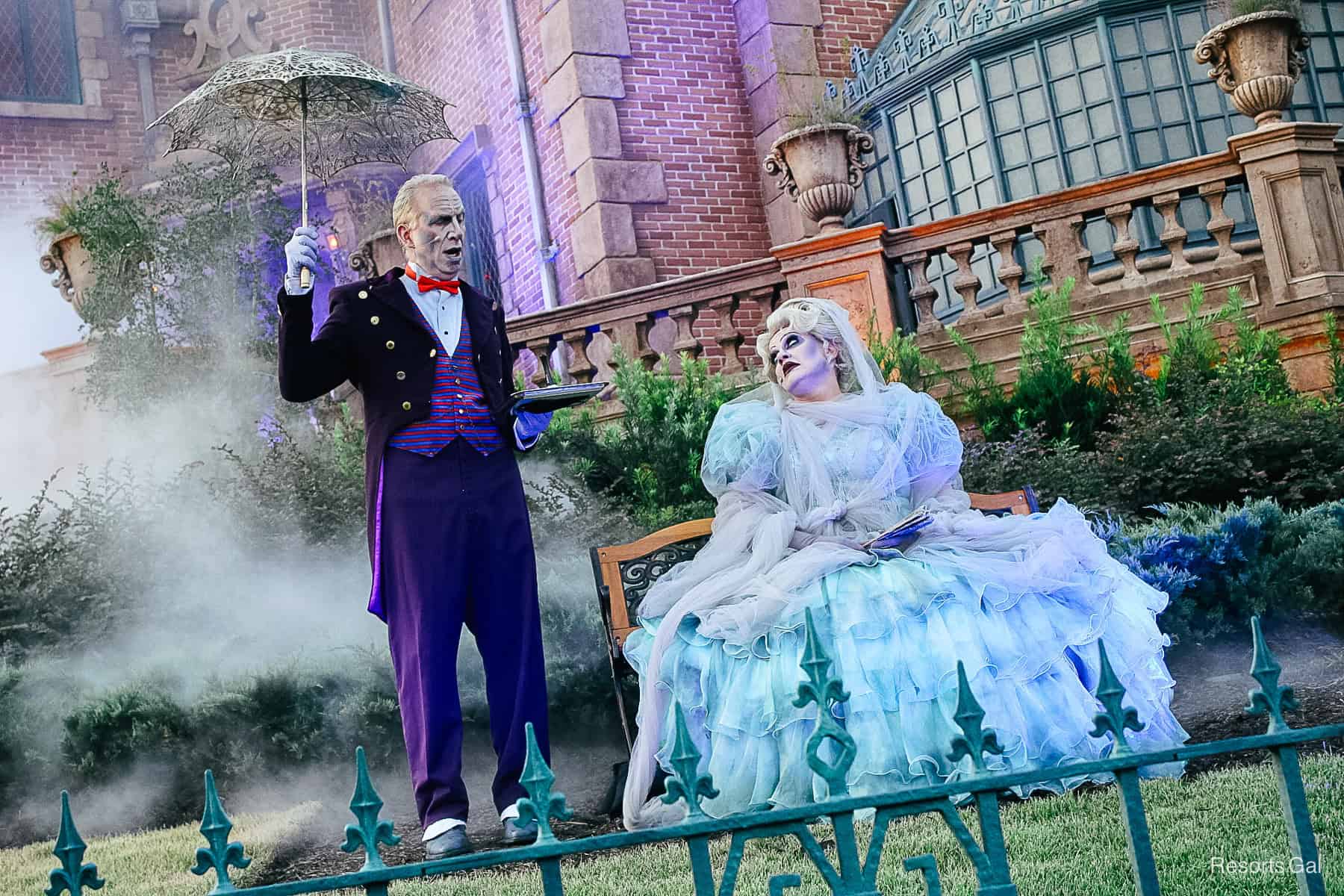 Madame Carlotta and the Haunted Mansion's Butler on the front lawn delight guests during Mickey's Not So Scary Halloween Party
