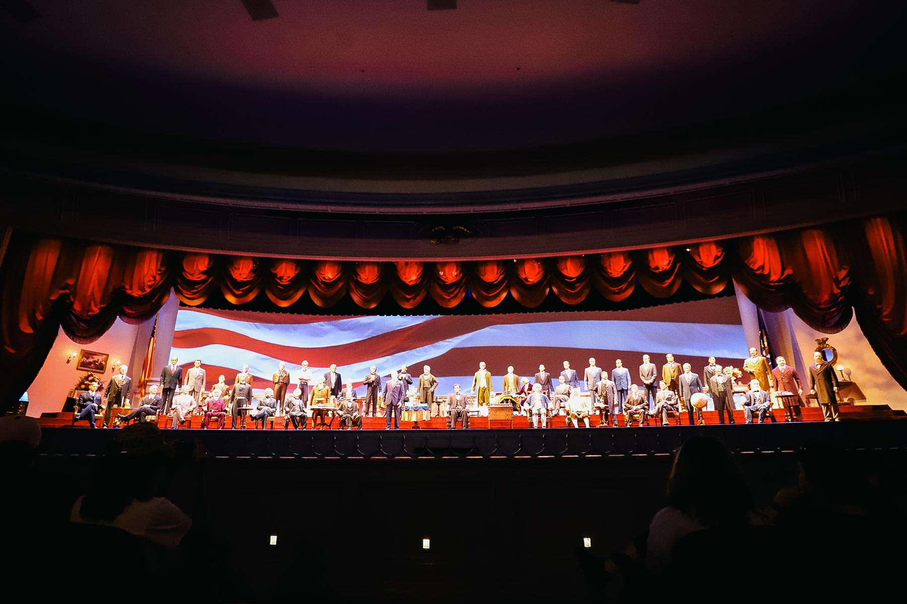 Presidents on stage at The Hall of Presidents. 