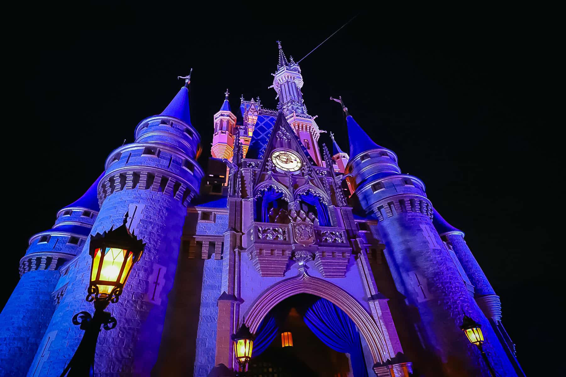 a closeup of Cinderella Castle at nighttime 