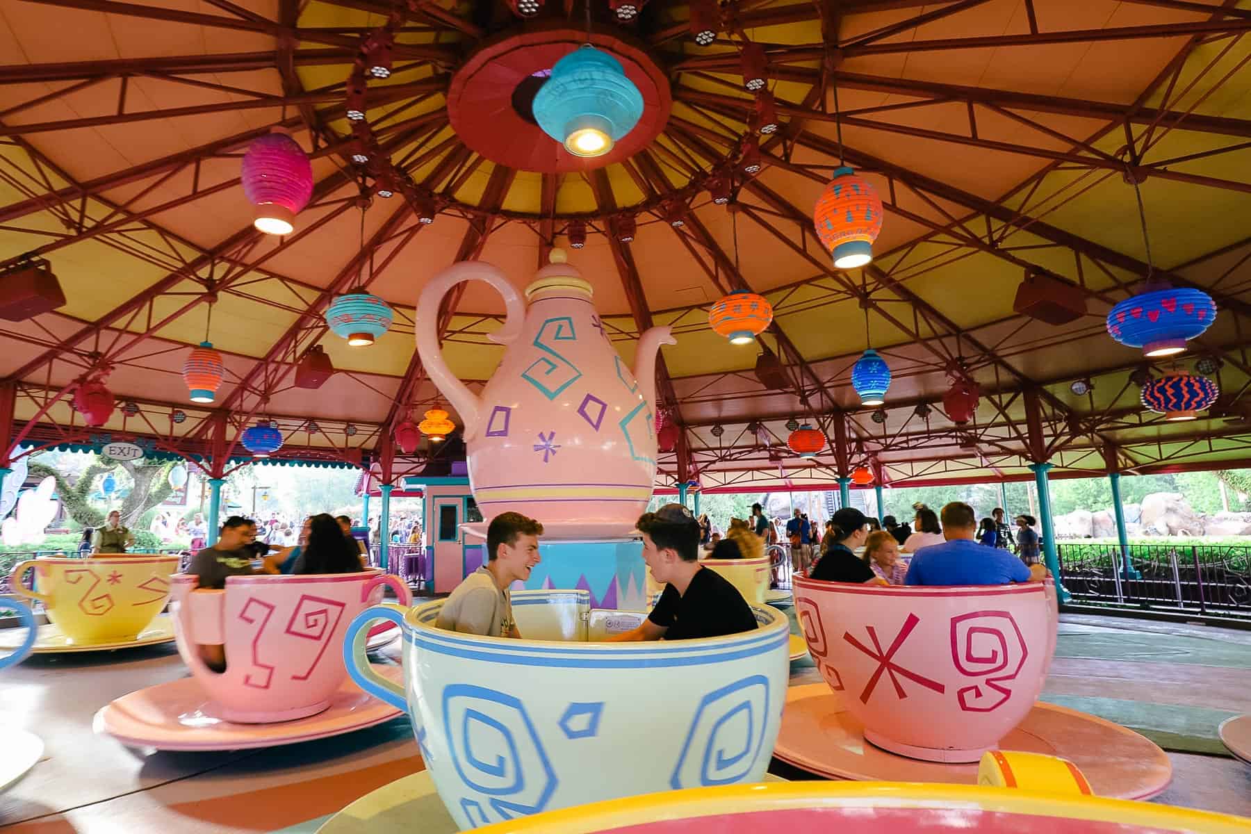 Guests spinning on the Mad Tea Party ride at Magic Kingdom. 