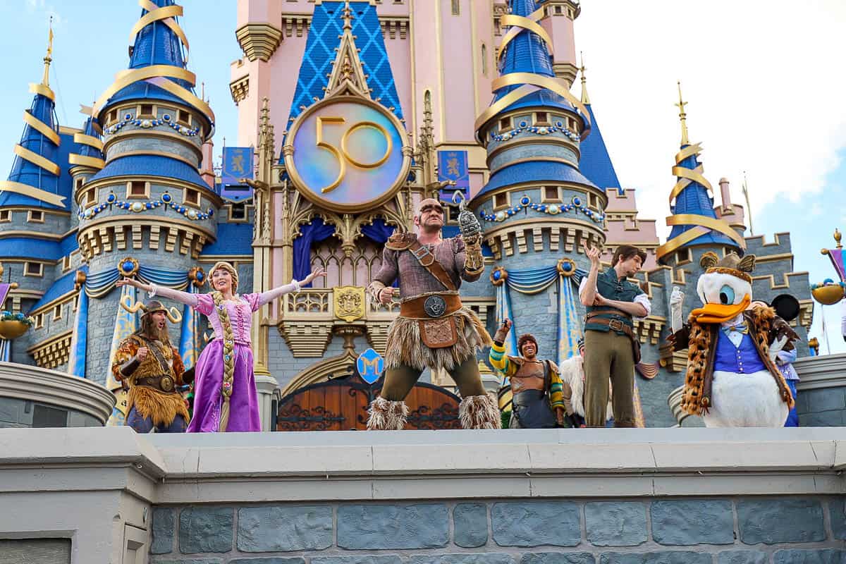 Rapunzel dances with other cast during the daily stage show at Magic Kingdom. 
