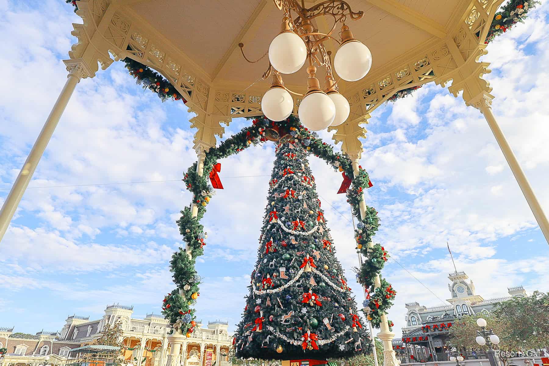 a view of Main Street U.S.A. Christmas Tree taken from under the overhand of the Emporium 