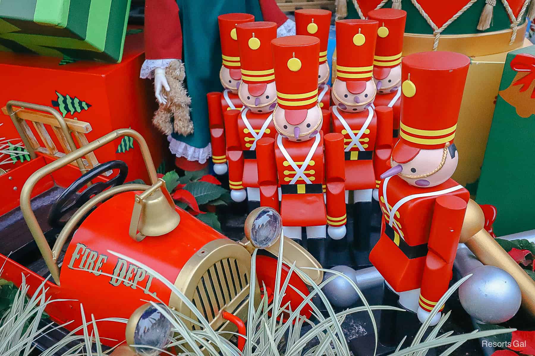 a set of mini toy soldiers under the tree on Main Street USA 