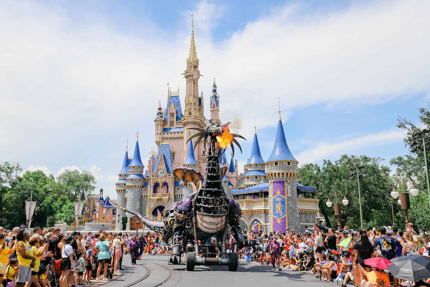 Maleficents dragon breathing fire during the parade. 