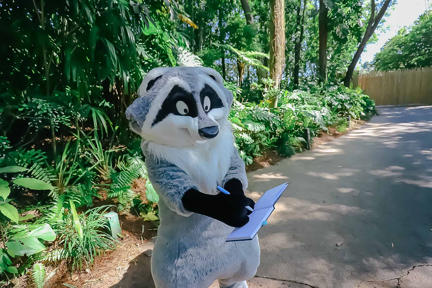 Meeko signing his autograph. 