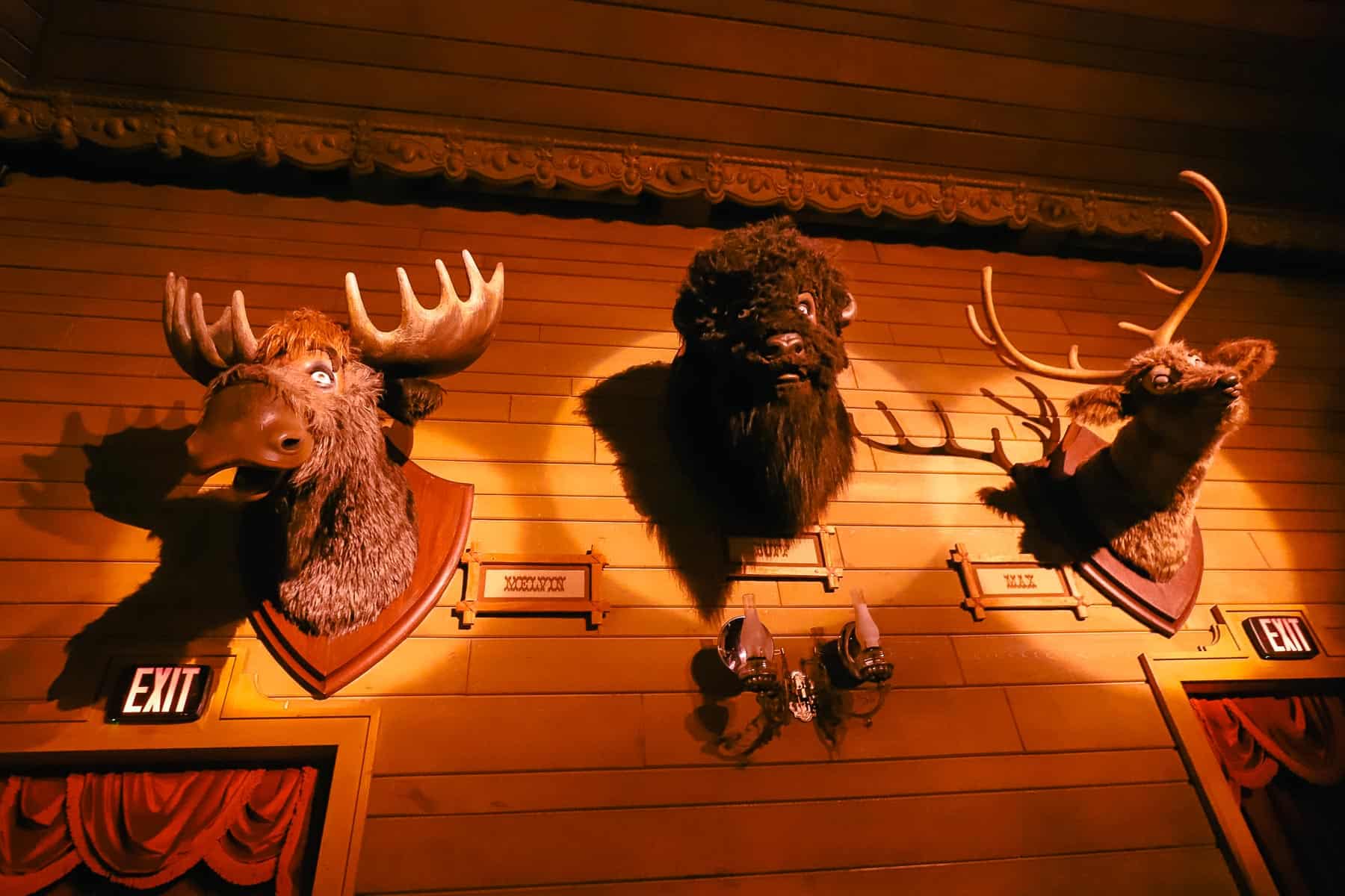 Melvin, Buff, and Max are talking taxidermy in the Country Bear Jamboree. 