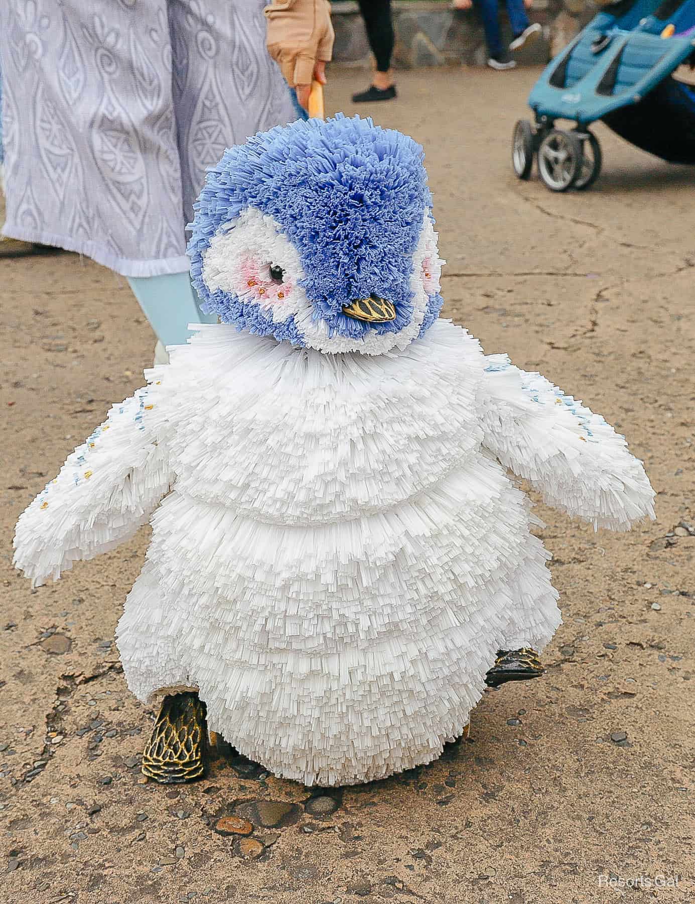 a penguin puppet as part of the Merry Menagerie at Disney's Animal Kingdom during Christmas