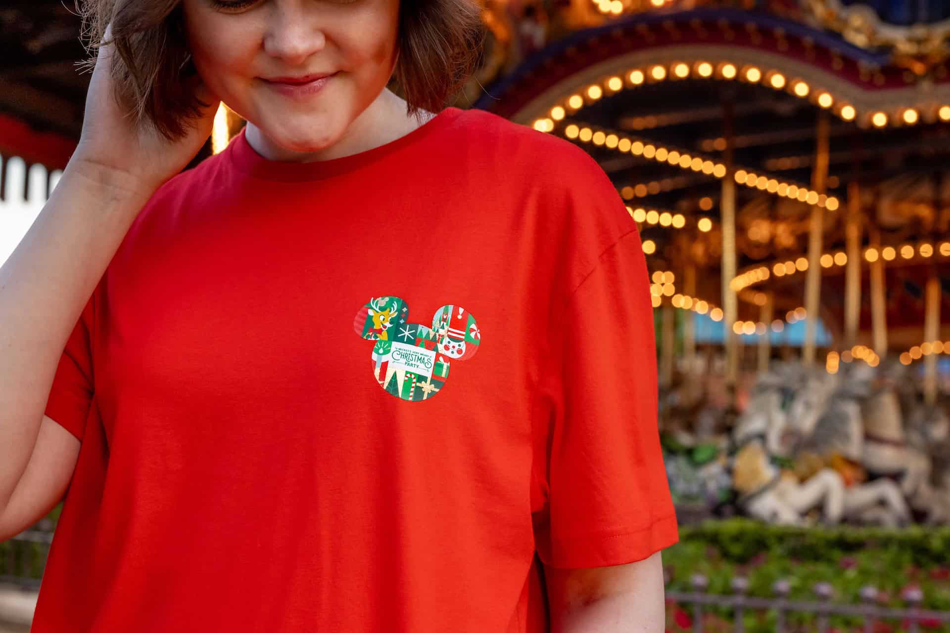 front of Mickey's Very Merry Christmas Party T-Shirt in red 2026