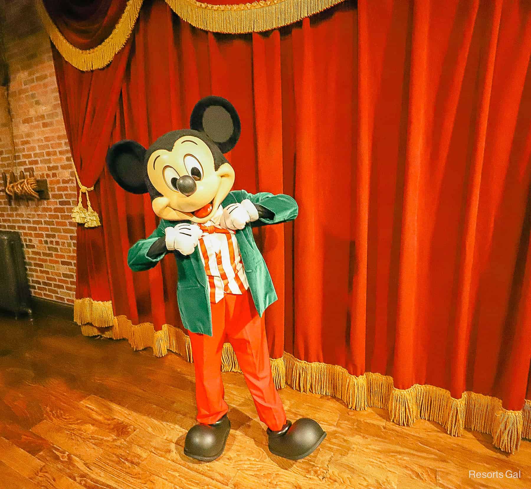 Mickey Mouse wearing his Christmas outfit