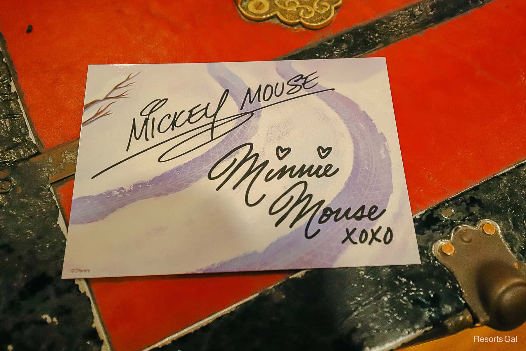 the back side of the autograph card has Mickey and Minnie's signatures 